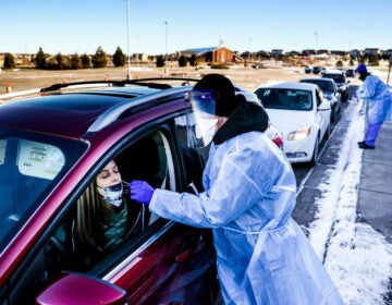 A coronavirus variant that is thought to be more contagious was detected in the United States in Elbert County, Colo., not far from this testing site in Parker, Colo. The variant has been detected in several U.S. states. (Michael Ciaglo/Getty Images)