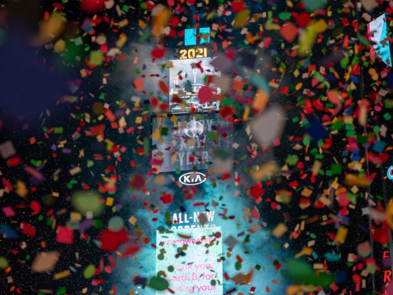 Confetti falls in front of the New York Times Square 2021 ball drop