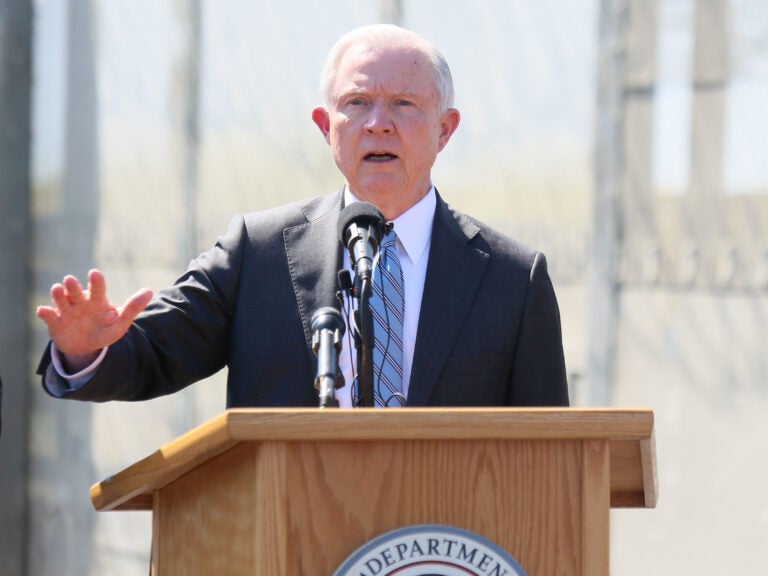 Then-Attorney General Jeff Sessions visits California in April 2017. Department of Justice Inspector General Michael Horowitz has released a critical review of Sessions' 2018 zero tolerance policy on people trying to cross the Southwest border.