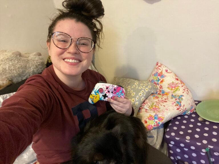 Mackenzie Warren prepping for her day of playing video games on Nintendo Switch and hanging out with her cat.