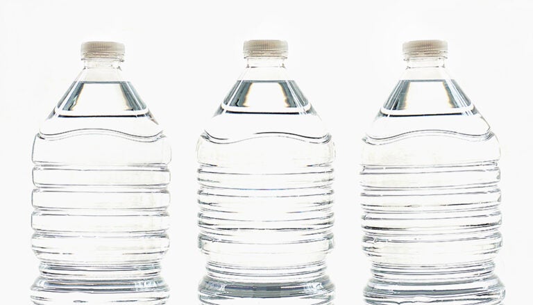 Three plastic water bottles