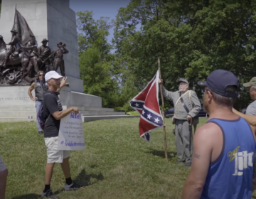 Scott Hancock speaks in front of the Virginia monument in this still from the upcoming documentary 