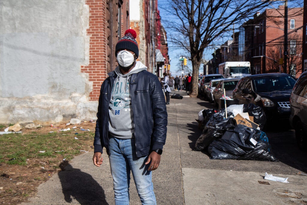 Terrill Haigler wears a face mask on North 17th Street