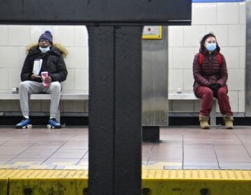 Passengers wait to board the Market-Frankford line at City Hall