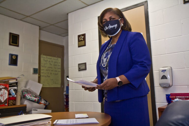 Principal Andrea Surratt at work in her office at E. W. Rhodes Elementary School in Philadelphia. (Kimberly Paynter/WHYY)