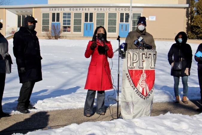 City Councimember Helen Gym joins teachers and union leaders in front of Samuel Gompers School