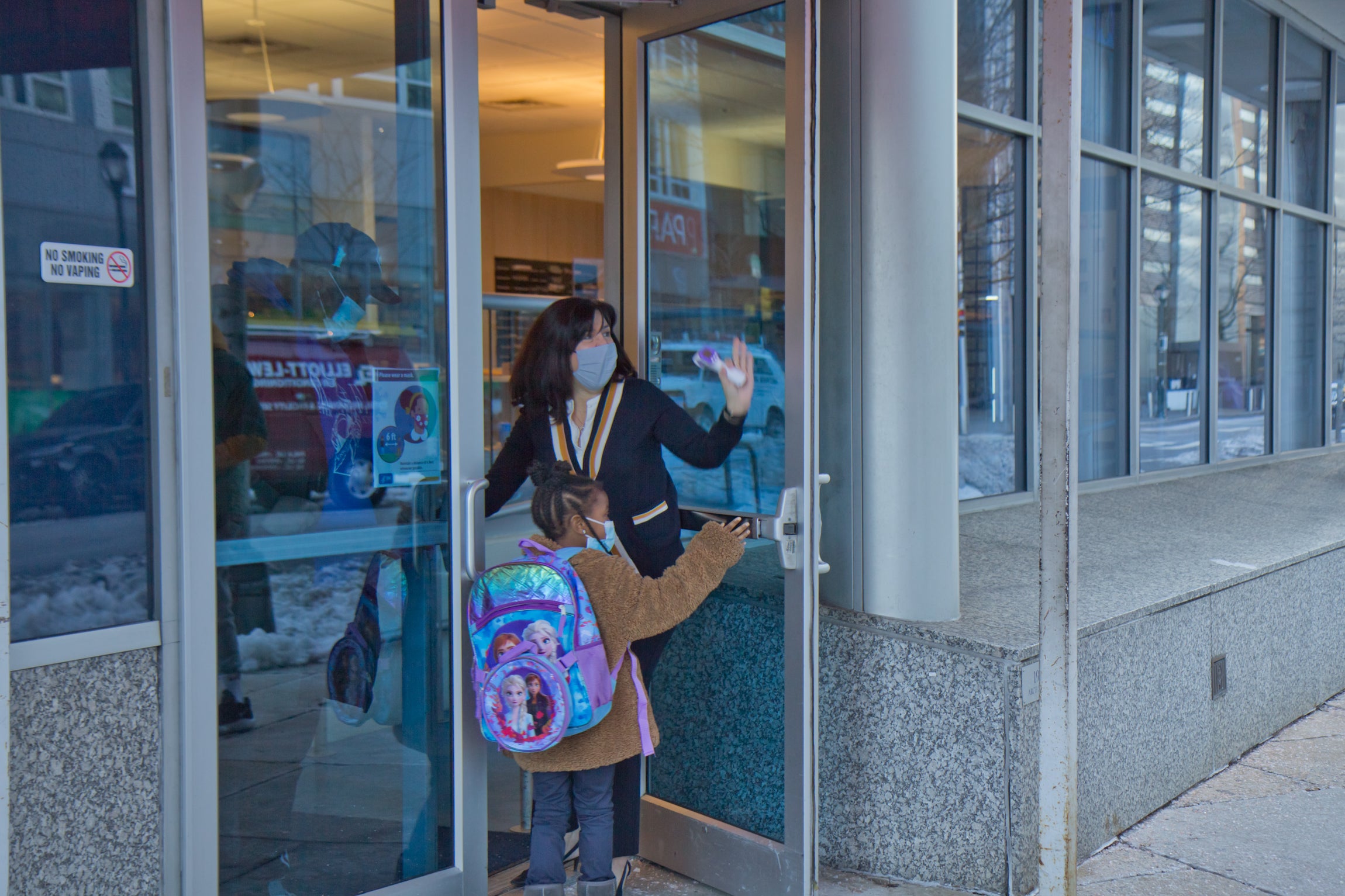 Russell Byers Charter school CEO Carol Domb waves to a parent