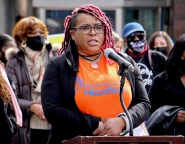 Chantay Love speaks outside Olney Transportation Center