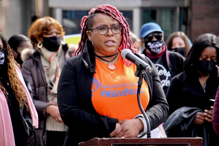 Chantay Love speaks outside Olney Transportation Center