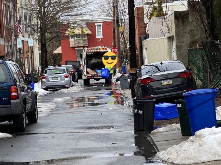 A Philadelphian took a photo of recycling getting picked up with trash. The face of the city worker is obscured to protect their identity. (Jason Peters/Twitter)