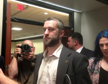 FILE - In this May 29, 2015, file photo, television actor Dustin Diamond, center, leaves court in Port Washington, Wis. (AP Photo/Dana Ferguson, File)