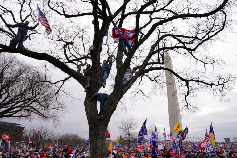 FILE - In this Wednesday, Jan. 6, 2021 file photo, supporters of President Donald Trump participate in a rally in Washington. (AP Photo/John Minchillo)