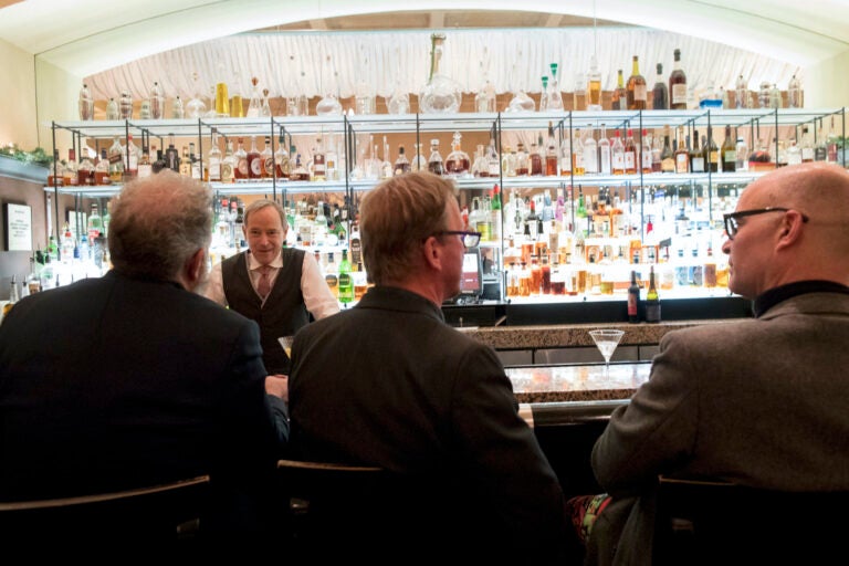 In this Tuesday, Nov. 27, 2018, photo, a bartender talks to a customer at the Gotham Bar and Grill in New York. (AP Photo/Mary Altaffer)