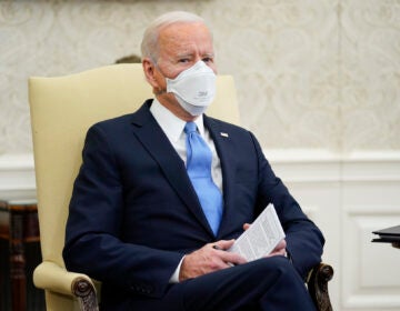 President Joe Biden speaks during a meeting with a bipartisan group of mayors and governors to discuss a coronavirus relief package, in the Oval Office of the White House, Friday, Feb. 12, 2021, in Washington. (AP Photo/Evan Vucci)