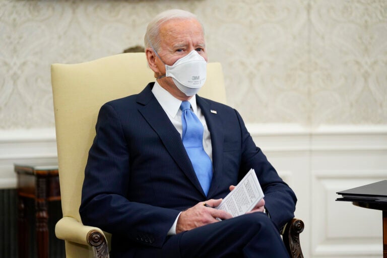 President Joe Biden speaks during a meeting with a bipartisan group of mayors and governors to discuss a coronavirus relief package, in the Oval Office of the White House, Friday, Feb. 12, 2021, in Washington. (AP Photo/Evan Vucci)