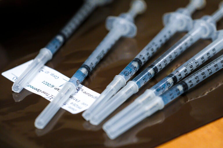 COVID vaccine in syringes ready for inoculations. (Nelvin C. Cepeda/The San Diego Union-Tribune via AP, Pool)