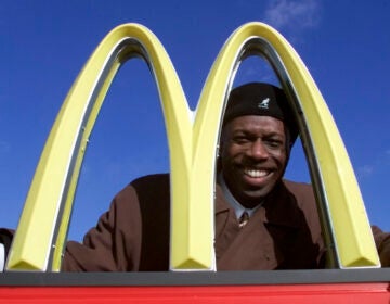 Herb Washington poses for a portrait outside his McDonalds restaraunt in Niles, Ohio, Thursday, Jan. 3, 2002. (AP Photo/Ron Schwane)