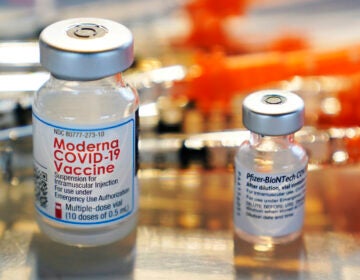 Vials for the Moderna and Pfizer COVID-19 vaccines