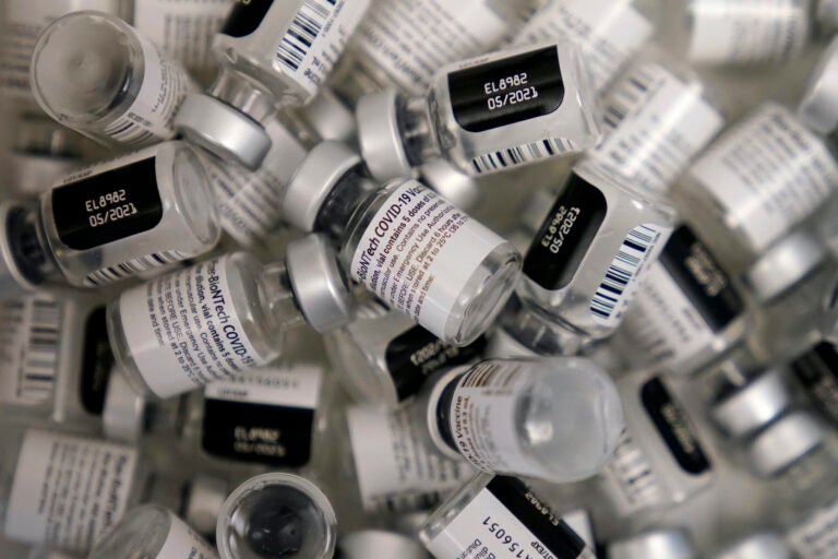 Empty vials of the Pfizer-BioNTech COVID-19 vaccine