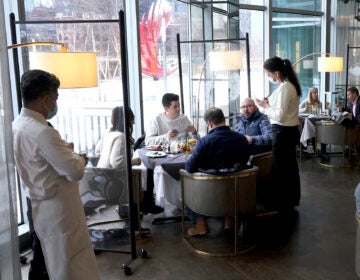 Patrons have lunch indoors at Gibsons Italia restaurant