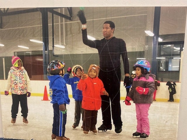 Pictures of instructors and children at Laura Sims Skate House in Cobbs Creek are hung on the walls throughout the rink. (Taylor Allen/WHYY)