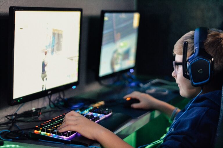 A young person plays video games online