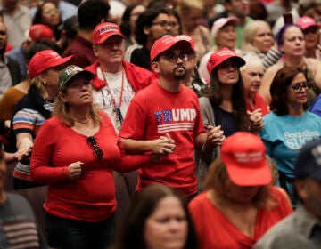 Supporters of President Donald Trump pray during a rally for evangelical supporters at the King Jesus International Ministry church, Friday, Jan. 3, 2020, in Miami. (Lynne Sladky/AP)