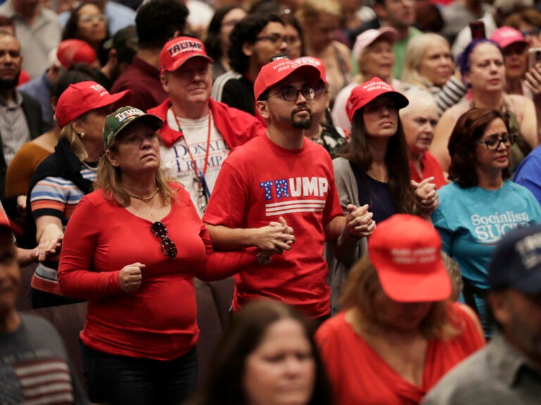 Supporters of President Donald Trump pray during a rally for evangelical supporters at the King Jesus International Ministry church, Friday, Jan. 3, 2020, in Miami. (Lynne Sladky/AP)