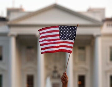 On Wednesday, President Biden lifted a Trump-era ban on green cards issued outside the United States and temporary work visas. (Carolyn Kaster/AP)