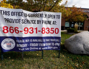 A sign outside a U.S. Social Security Administration office in Mount Prospect, Ill., in October last year. Closed SSA offices across the country are being blamed for a 30 percent drop in applications for an aid program for the most vulnerable.