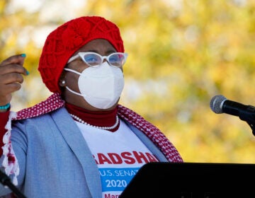 Marquita Bradshaw speaks before a Power Together Women's March.