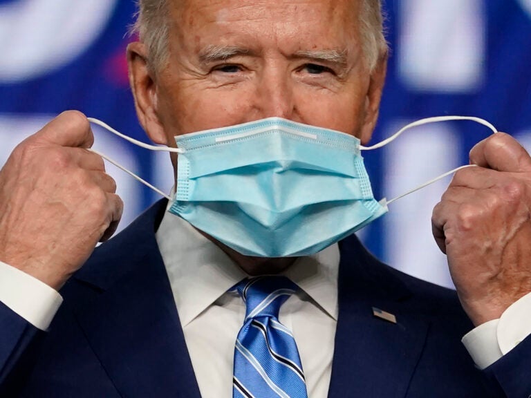 President Joe Biden, pictured on the campaign trail in Nov. 2020, has long encouraged Americans to mask up in the fight against COVID-19. On Wednesday, his administration announced it will provide 25 million masks to community health centers and food banks across the country. (Carolyn Kaster/AP)