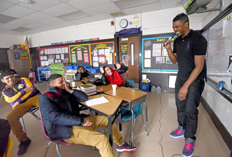 In 2015, Camden High teacher Alex Jones in the classroom on the day he tells his students he is leaving teaching to become an administrator.  (Photo by April Saul for WHYY)