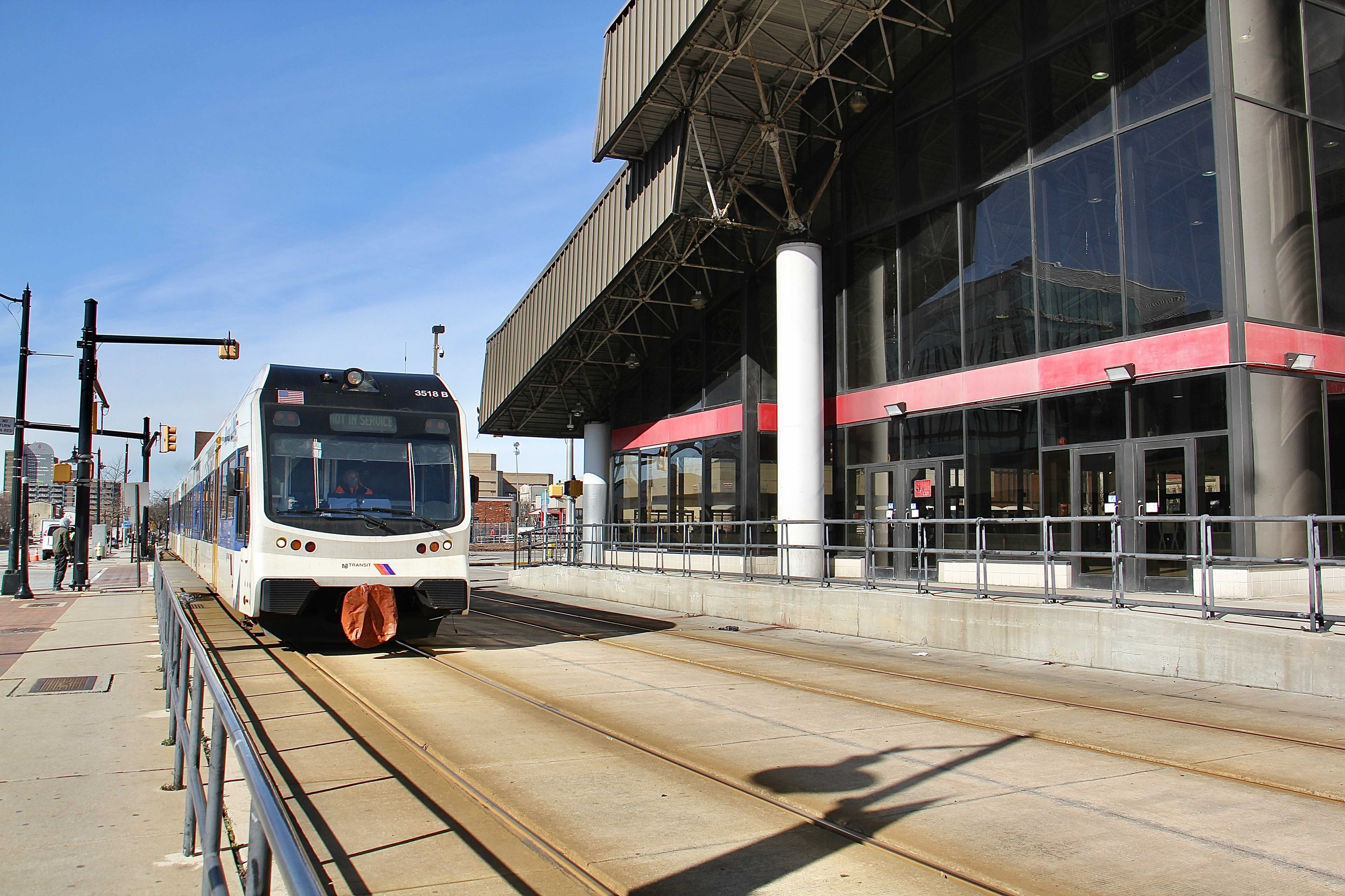 A Riverline train passes the Walter Rand Transportation Center in Camden