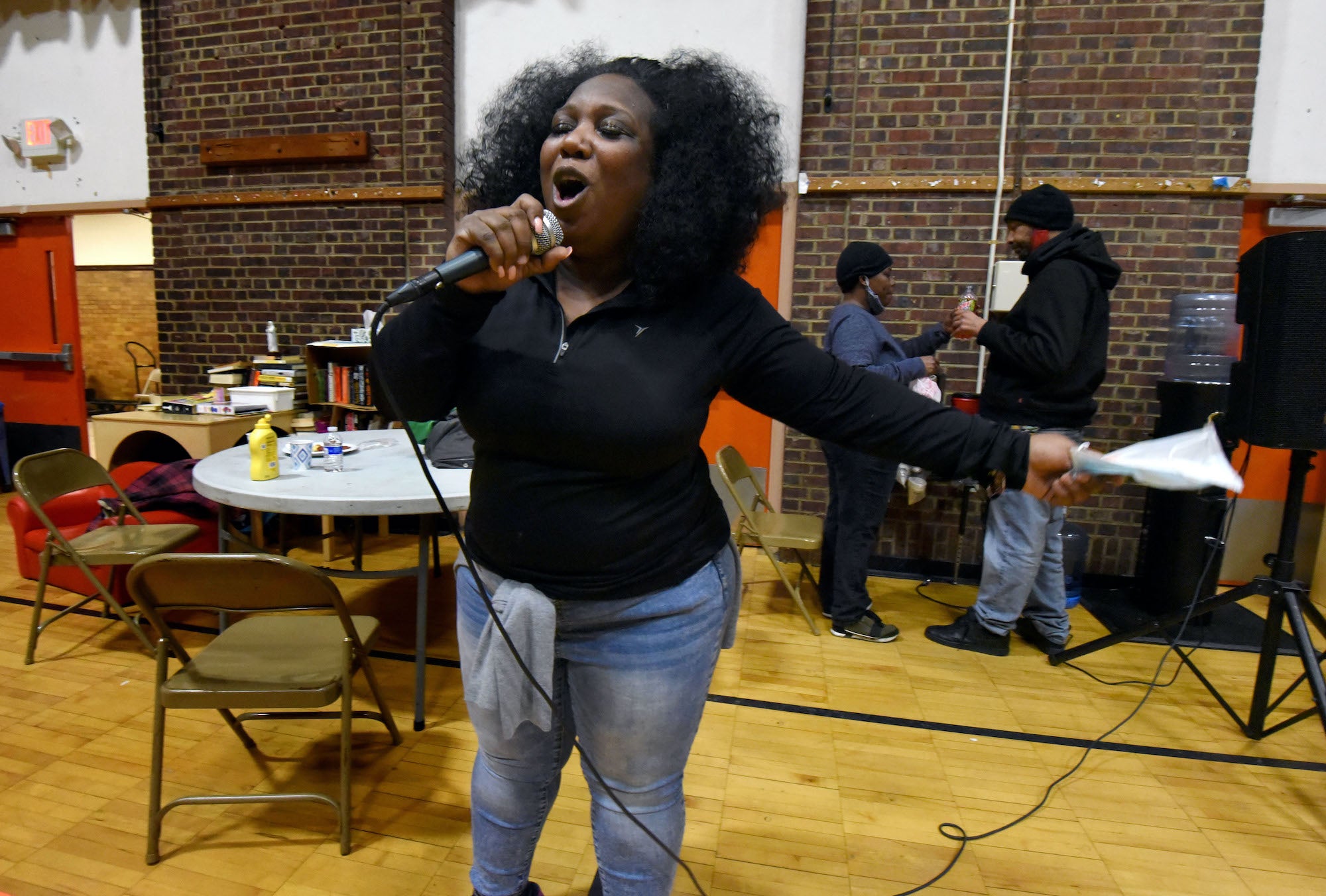 Tawanda Jones breaks into song to entertain her patrons