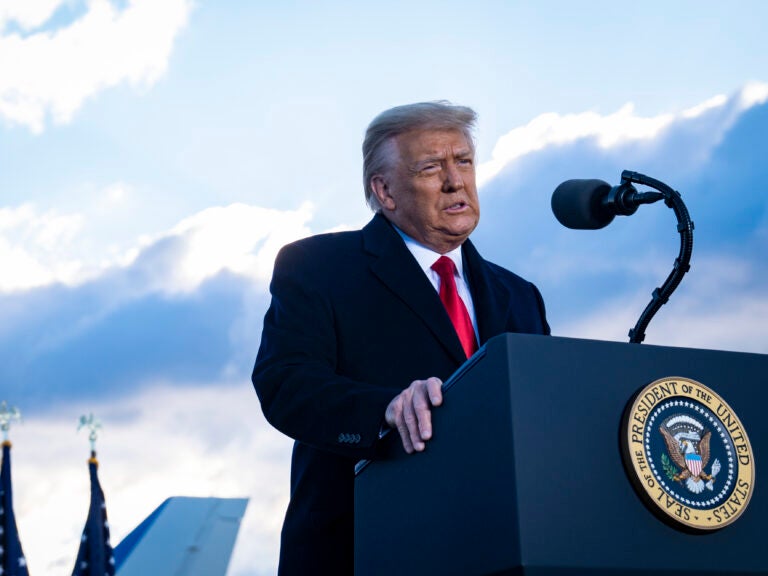 President Donald Trump speaks to supporters at Joint Base Andrews before boarding Air Force One for his last time as President on January 20, 2021 in Joint Base Andrews, Maryland