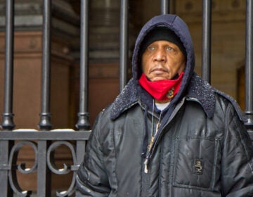 Jamal Johnson continues to protest for more resources to combat gun violence in Philadelphia at City Hall despite snow and more forecast for later today. (Kimberly Paynter/WHYY)