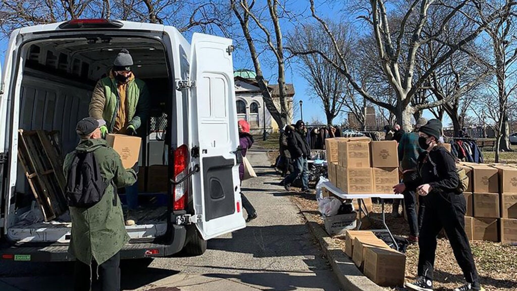 Volunteers with City Wide Mutual Aid at a delivery of groceries and food in Kensington