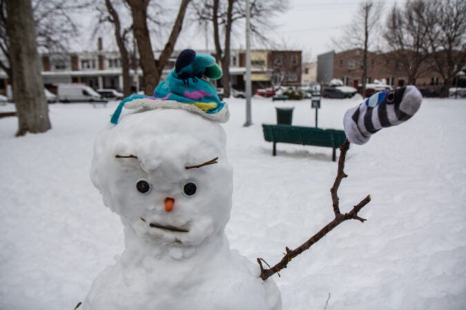 A snowman greets its neighbors at Powers Park in Port Richmond.