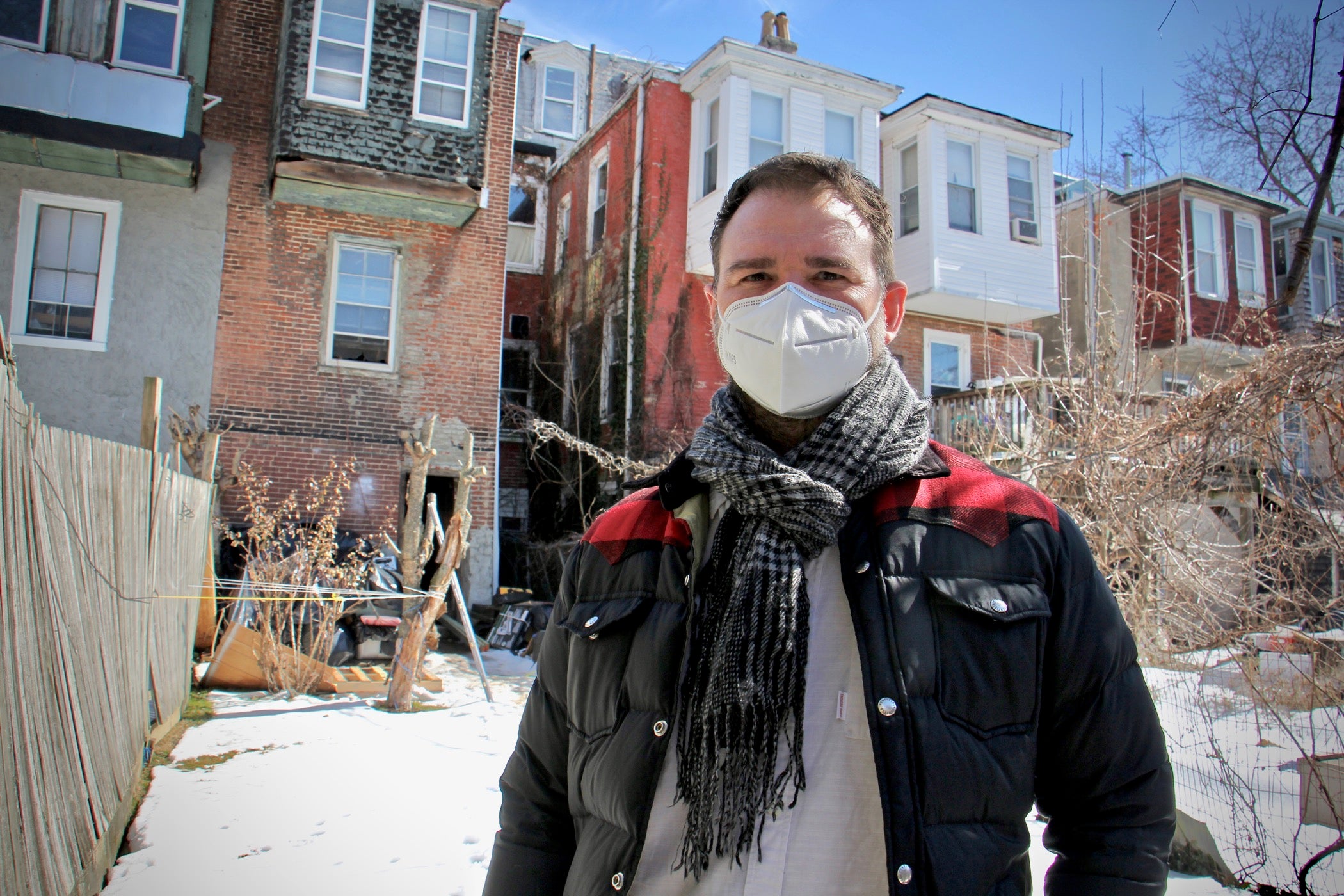 Mark Christman of Ars Nova Workshop stands in the backyard of the Sun Ra House