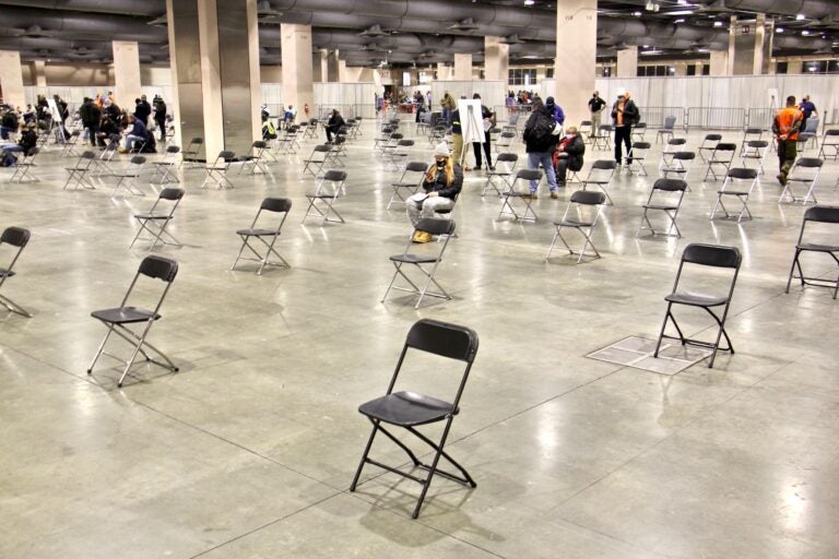 Chairs are seen inside the FEMA-run vaccination site at Pennsylvania Convention Center