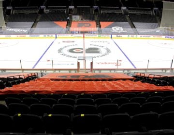No one will be allowed to sit in the first ten rows around the ice in order to protect players, who have traded their plexiglass enclosures for netting to improve air circulation. (Emma Lee/WHYY)