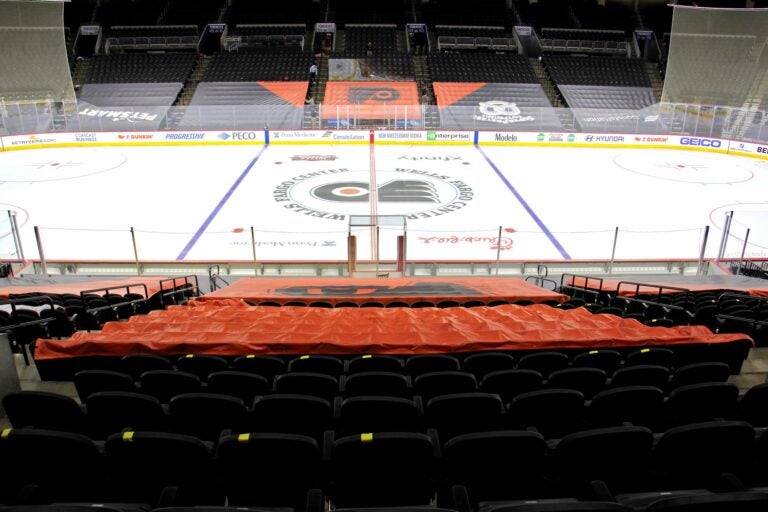 No one will be allowed to sit in the first ten rows around the ice in order to protect players, who have traded their plexiglass enclosures for netting to improve air circulation. (Emma Lee/WHYY)