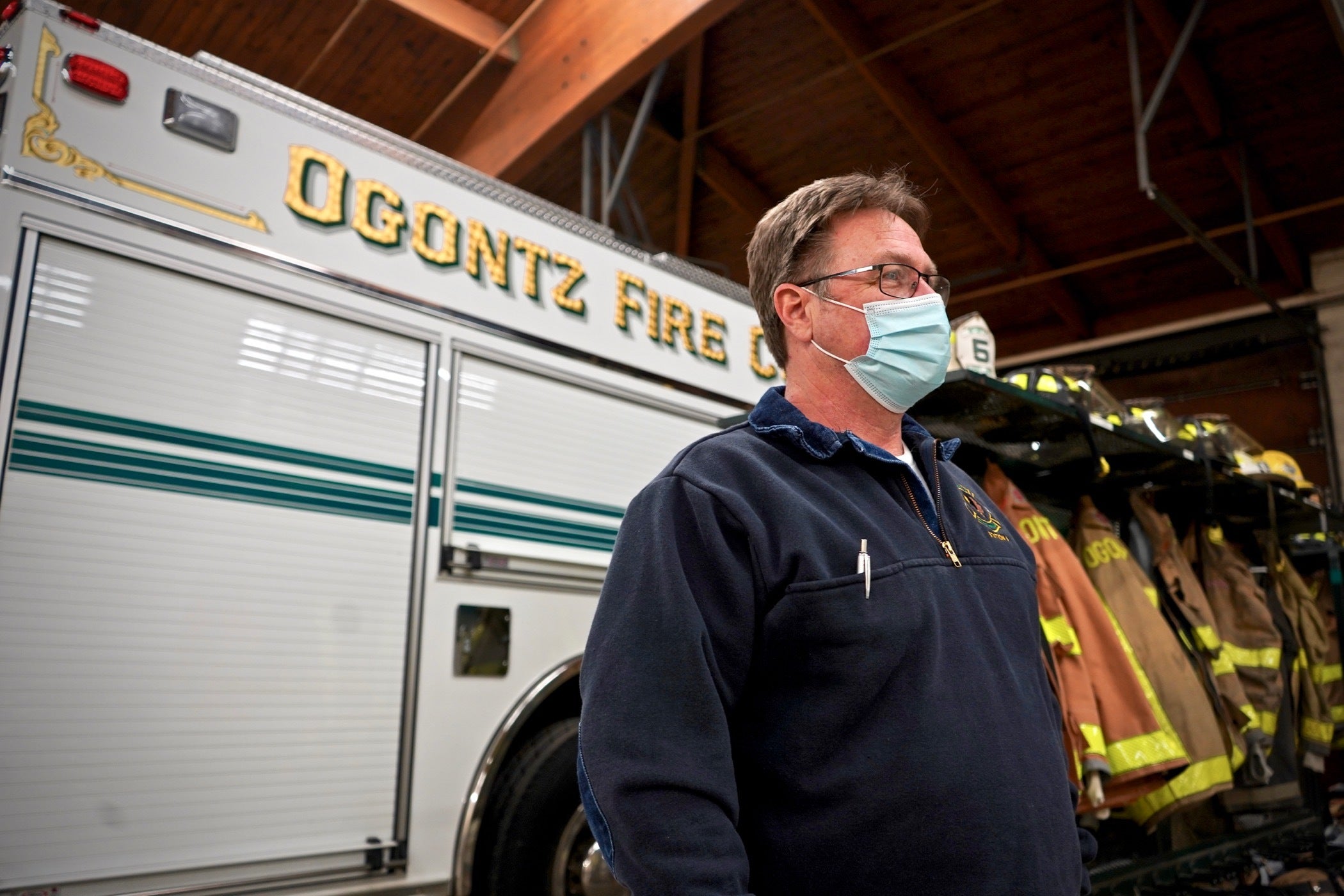 Art Gordon stands inside a fire station