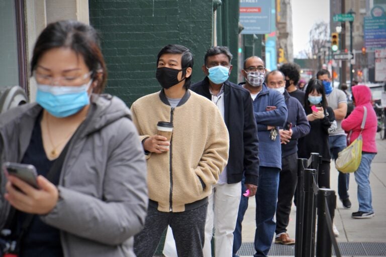 A line forms outside the Center for Architecture and Design on Arch Street