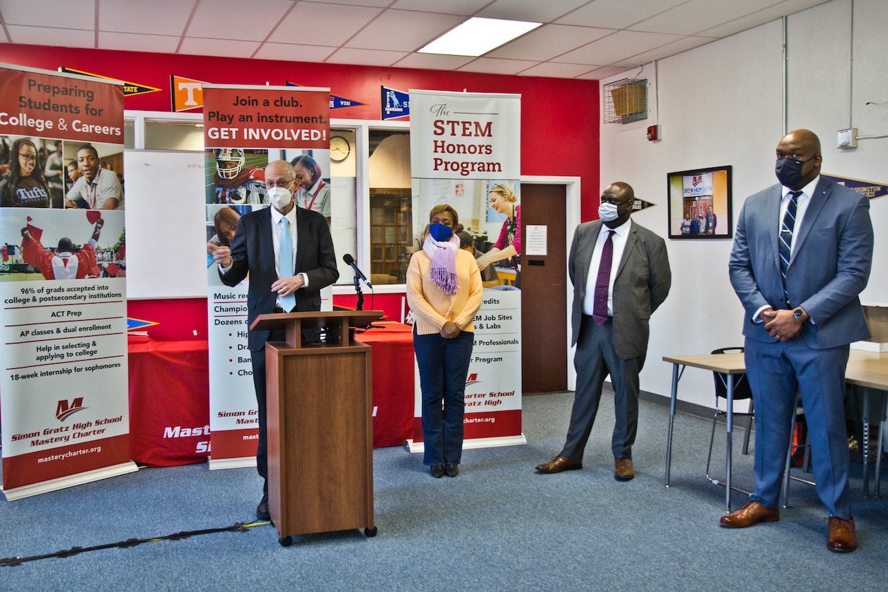 Dr. Thomas Farley, flanked by city officials, speaks at a press conference