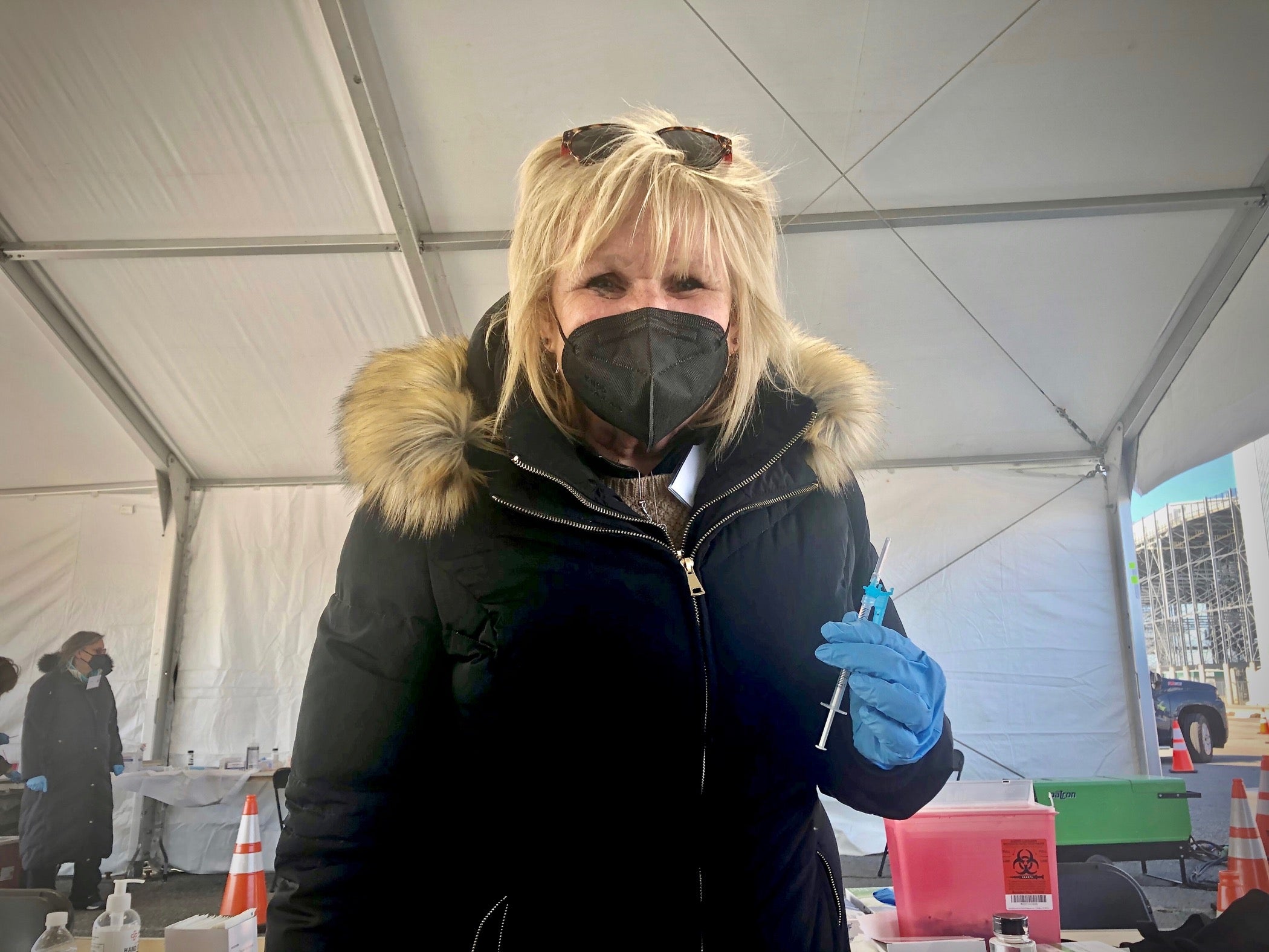 Nurse Debbie Petro wearing a face mask and winter coat