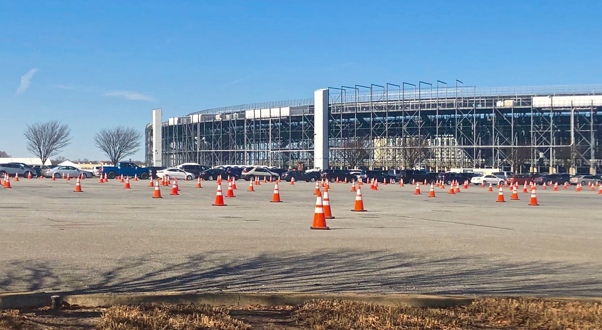 Orange traffic cones line the lanes in the speedway's vast parking lot.