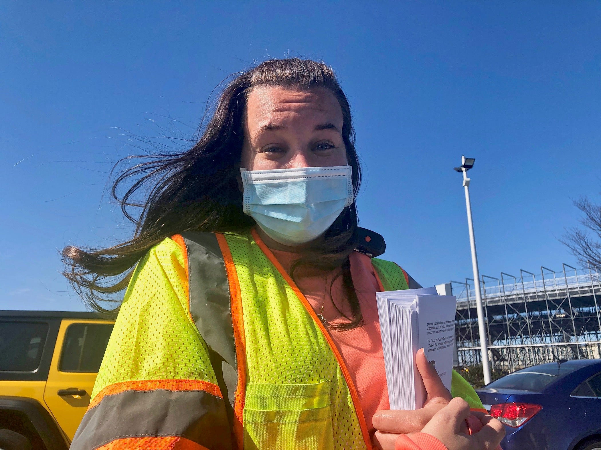 DelDOT's Lara Brown wears a reflective vest and face mask