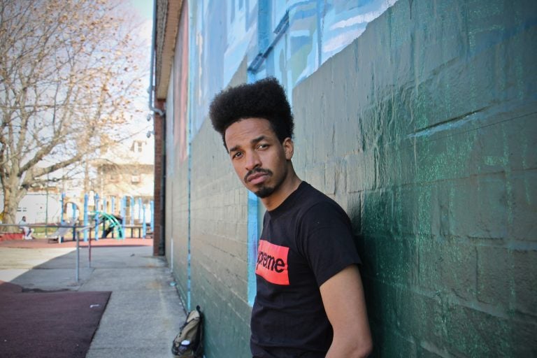 Amir Bey Richardson at Francis Myers Recreation Center, where he played as a child and where a 17-year-old boy was recently shot and killed. (Emma Lee/WHYY)